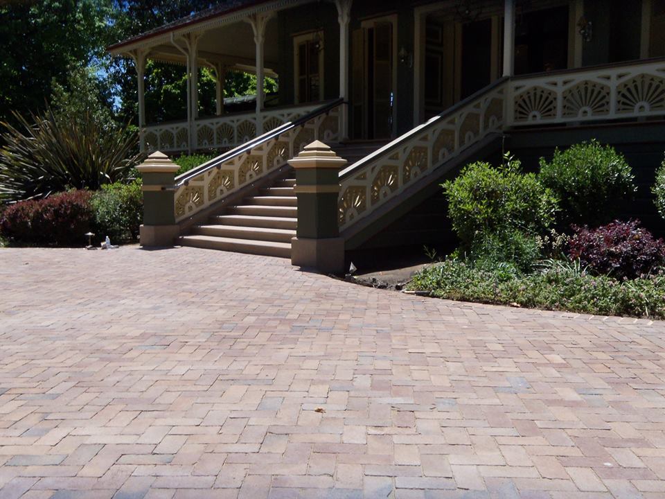 Paver driveway installation by Legacy Pavers.