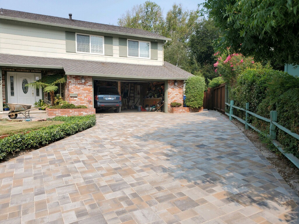 Stone paver driveway by Legacy Pavers.