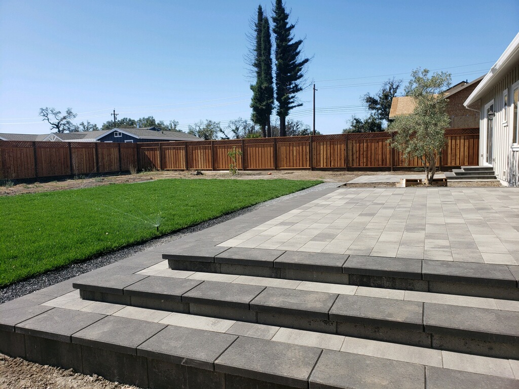 Stone paver steps installed by Legacy Pavers.