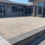 Stone paver patio by the Legacy Paver Group.